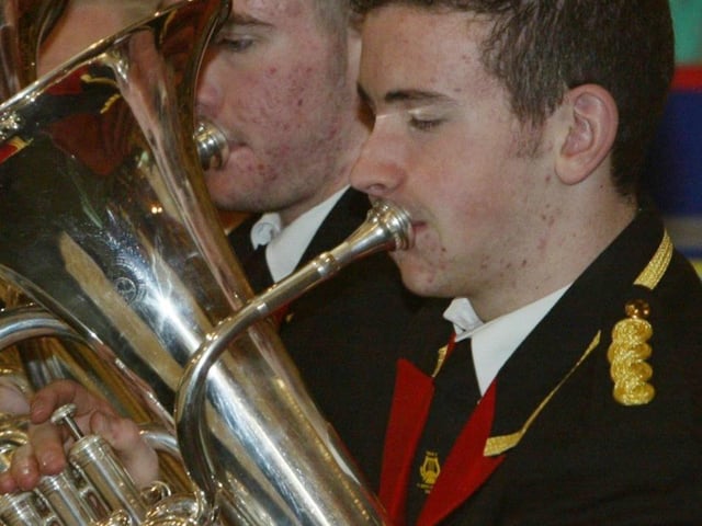 Members of Strabane Concert Brass pefroming at the Children in Crossfire Carol service at St. Mary's church, Cregan. (1612JB91) :Derry nativities and Christmas shows from December 2003