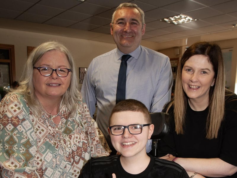 St. Joseph's Boys School A level student Conor McRae happy with his results on Thursday. Included from left are Paul Dillon, Classroom Assistant, Mr. Gerry Beattie, teacher and Conor's mum Louise.