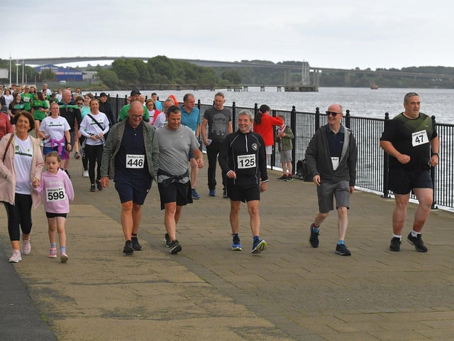 The 2023 Aodhan’s 5k race, run, walk moves along Foyle Embankment towards the Peace Bridge and St Columb’s Park on Thursday evening last. Photo: George Sweeney. DER2326GS – 59