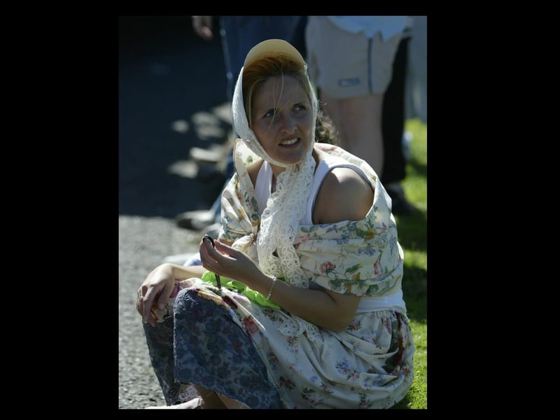 Joanna McCourt takes a rest during the parade.  (2608JB42)