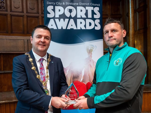 The Mayor, Councillor Ruairí McHugh, presents Ryan O'Donnell from Na Magha Doire CLG, with the 'Community Coach of the Year' award as he hosted the annual Derry City and Strabane District Council Sports Awards in the Guildhall. Picture Martin McKeown. 05.06.25