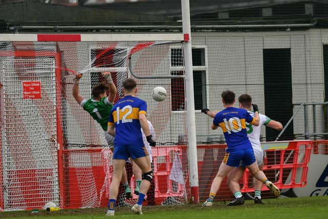 Naomh Padraig’s Drew McKinney (not in the picture) scores a first half goal against Craigbane. Photo: George Sweeney