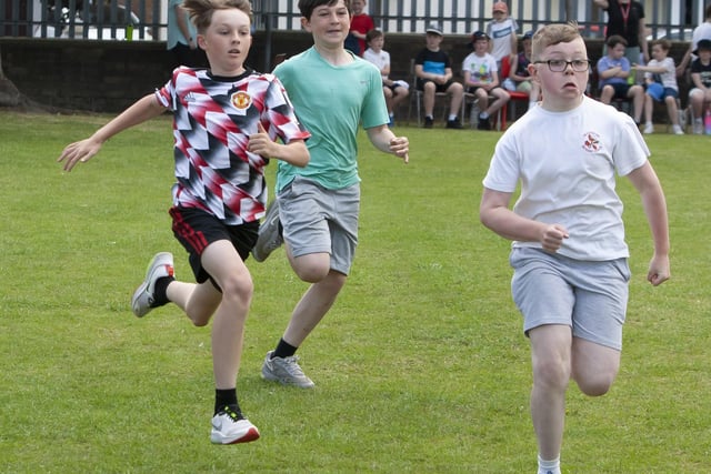 A sprint for the line in the P7 boys race.