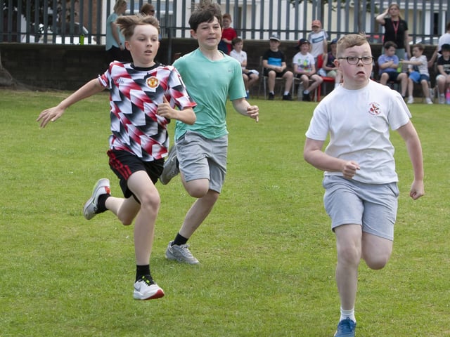 A sprint for the line in the P7 boys race.
