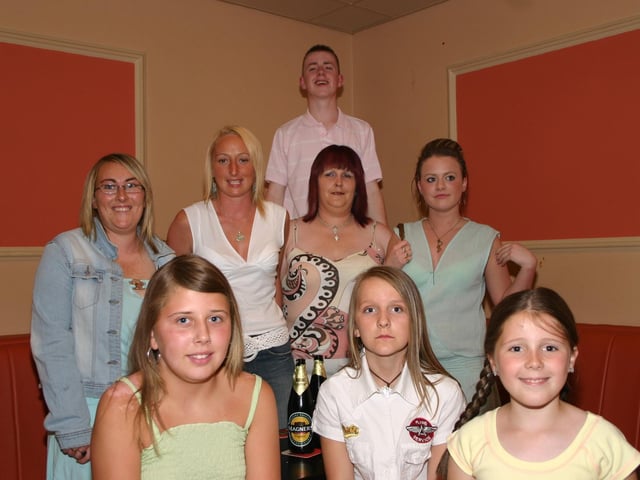 Terry Doherty with a group of family and friends having a good time  8061 : Parties and celebrations in August 2005.
