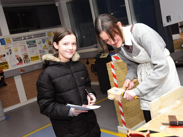 St Oliver Plunkett Primary School Pupil, Aimee Lee, with Oakgrove College Pupil, Holly.