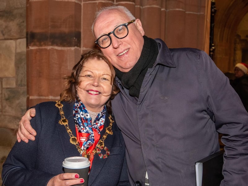Pat Armstrong from Hive Choir pictured with Derry City and Strabane District Council Mayor, Councillor Patricia Logue as she hosts a Countdown to Christmas family night in Guildhall Square with compere Michael Doherty. Picture Martin McKeown. 21.12.23