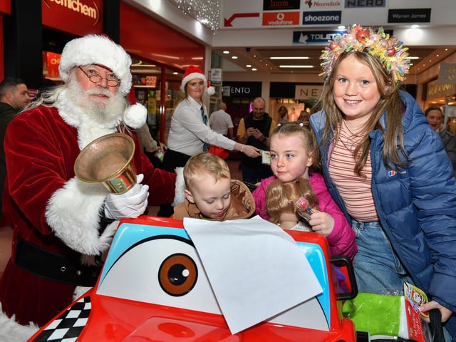 Santa arrives at the Richmond Shopping Centre on Saturday morning. Photo: George Sweeney
