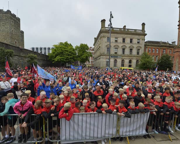 Foyle Cup teams and supporters gather in Guildhall Square. Photo: George Sweeney