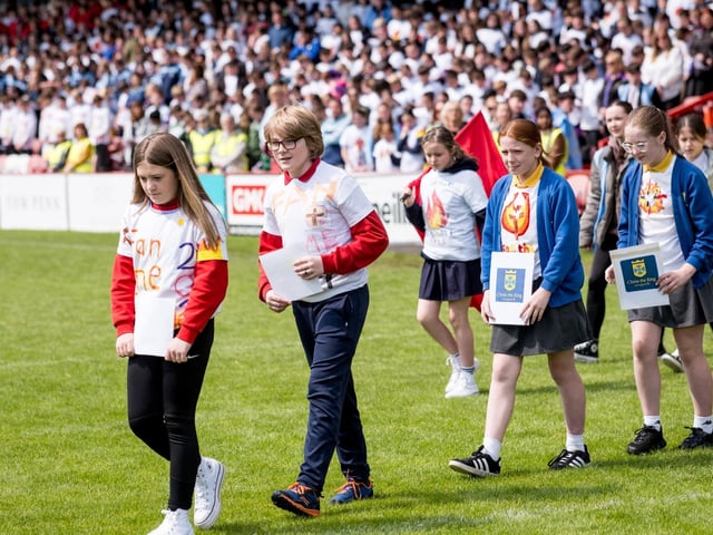 Participants at the Derry Diocese Fan The Flame annual Mass 2025 in Celtic Park.