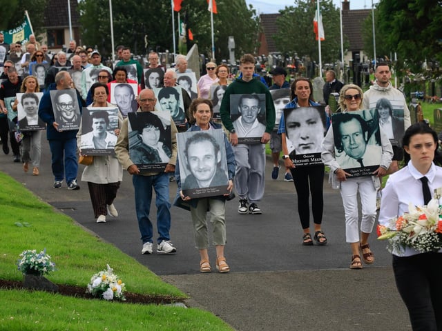 Relatives and friends carrying photographs of their loved ones at the Derry Volunteers Commemoration held at the Republican plot, City Cemetery. (Photo - Tom Heaney, nwpresspics)