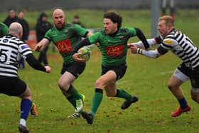 Killene Thornton of City of Derry evades a tackle from during Saturday’s game against CIYMS.  Photo: George Sweeney