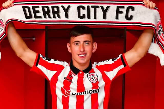 CUP AMBITIONS . . . Darragh Burns is unveiled as a Derry City supporter this week.