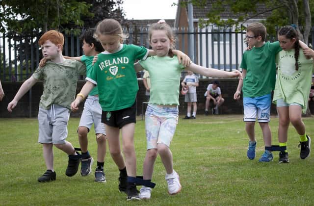 Getting to grips with the three-legged race.