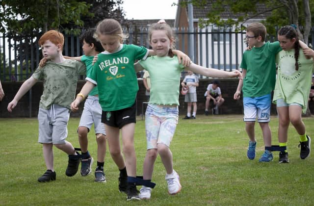 Getting to grips with the three-legged race.