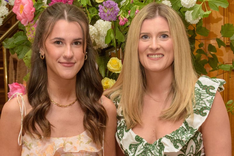The Mayor Councillor Patricia Logue hosted the annual Mayor’s Ball in the Guildhall in aid of her crossed Charities the Foyle Hospice and Ryan McBride Foundation. Pictured at the event are guests, Annie McCabe and Caitlin McBride Picture Martin McKeown. 24.05.24