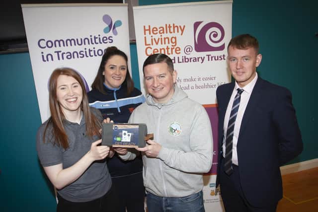 Julie White, OLT, pictured handing over a gift pack to Colly Kelly who took part in Saturday’s Men’s Health Day event at the Creggan Centre. Included is Aisling Hutton, Bogside, Brandywell Health Forum and Padraig Delargy, Sinn Fein. Jim McCafferty Photography.