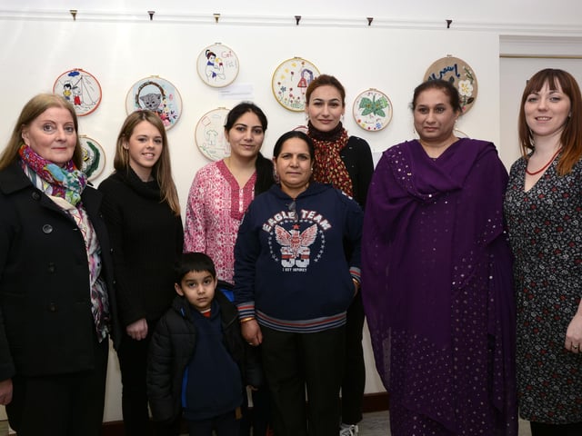 Pictured at the opening of the exhibition of work by students from the Women's Centre Multi Cultural and Young Women's Group in the Eden Place Arts Centre as part of International Women's Day were, from left, Catherine O'Connor, Danielle McCreadie, Geetika Kaushik, Suchita Bhatt, Abhinav Gaur, Nasim Takhsha, Yasmin Janjua, and Roisin O'Donnell, art facilitator. DER1215-105KM