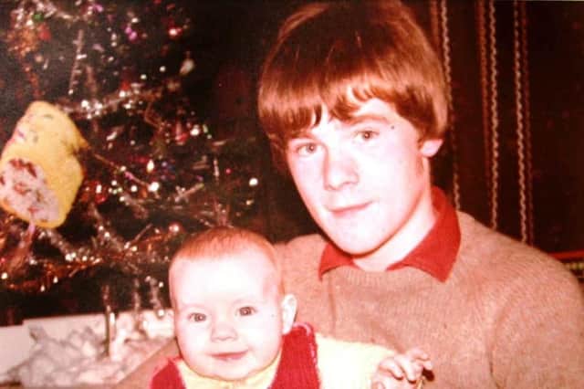 Paul Whitters (15) - pictured with his baby brother Aidan - died in April 1981 after being hit in the head with a plastic bullet fired by a member of the RUC.