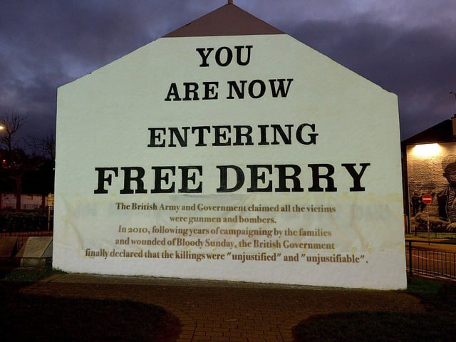One of the projected images, on Free Derry Corner on Thursday evening, of the British colonial past from the ‘The Sun Never Set And The Blood Never Dries’ art project created by Art Everywhere. The event was part of Bloody Sunday 51 anniversary. Photo: George Sweeney. DER2305GS – 115