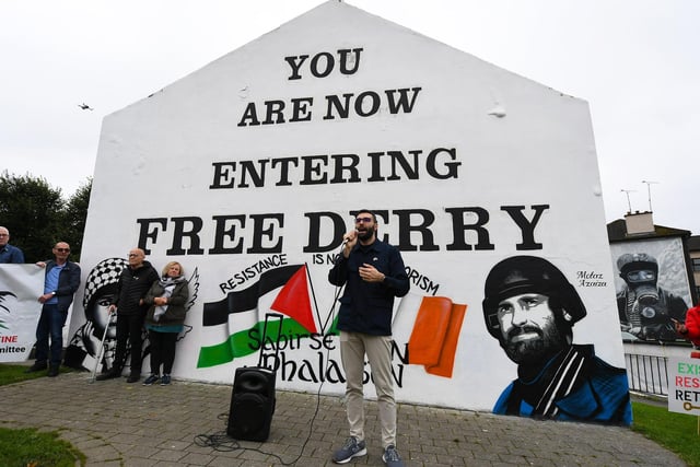 Palestinian photojournalist Motaz Azaiza speaking at Free Derry Wall on Thursday afternoon. Photo: George Sweeney