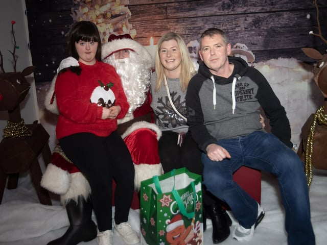 Niamh and her parents meet Santa Claus on Monday night.