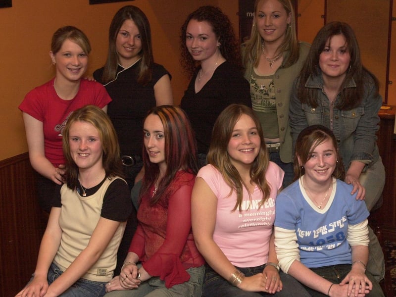 Contenders for the festival queen crown at the 36th Clonmany Festival. Included, front from left, Jacinta Mulhern, Comiskey's Bar, Claire Doherty, Clonamany Youth Club, Laura Doherty, The Spinning Wheel, and Michelle Hands, McDaid's Supermarket. Standing, from left, Louise McCLoskey, High Stool Bar, Laura Doherty, Briney's Bar, Shauna Devlin, Pollen Beach Hotel, Caroline Doherty, Strand Hotel, and Mairead Tully, Coyle's. (2907PG03) :Derry youngsters enjoying summer in August 2003
