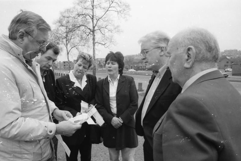 Senior barrister Tony Gifford meets members of the Bloody Sunday families in Rossville Street.