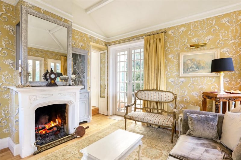With French doors, open fireplace and Juliet balcony.