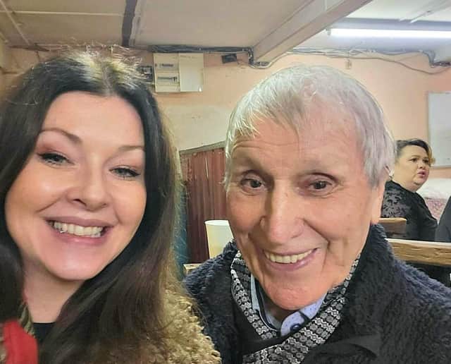 Founding member of the Carn Men’s Shed project Eileen Doherty enjoying the exhibition night with Joe McLaughlin (Henry) – father of ‘The Henry Girls’ who also hosts weekly music classes in the Men’s Shed.
