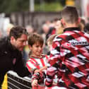 Derry City manager Ruaidhri Higgins poses for a selfie with a young fan. Photograph: George Sweeney