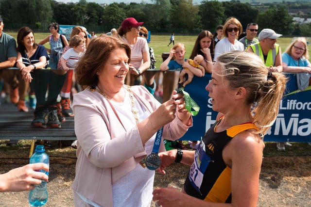 Mayor of Derry City and Strabane District Council, Councillor Patricia Logue presents Claire McGuigan with her runner-up medal in the ladies' competition. (Photo: Karol McGonigle_