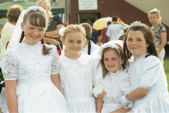 These young girls decided to dress in white for their street party in Brookdale Park. They are L/R:- Catherine McFadden, Lauren Doherty, Emily McCarron and Zoe Porter. 190803HG17