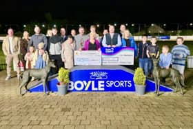 The organising committee of last week's Bear Run Motor Show fundraiser present cheques for E8,000 each to Donegal Hospice and Foyle Hospice.