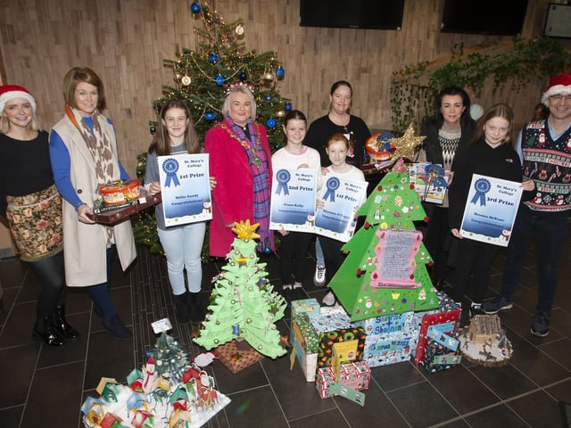 Mayor with prize winners and staff.