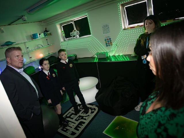 The Children's Commissioner Mr. Chris Quinn getting a view of one of the new sensory rooms at Holy Child PS on Thursday.