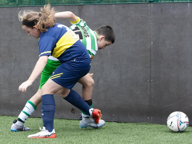 Action from one of the group games between Top of the Hill Celtic and Don Boscos.