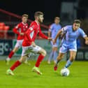 Derry City midfielder Joe Thomson keeps a close eye on Sligo Rovers striker Aidan Keena, during Monday night's game.