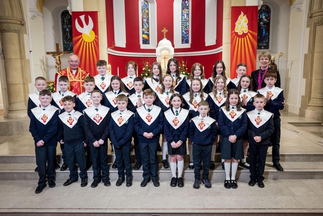 Pupils from Mrs McConnell's Class, St Patrick's Primary School, pictured at their confirmation at St Patrick's Chapel, Pennyburn. Included, is Fr Noel McDermott. (Stephen Latimer)