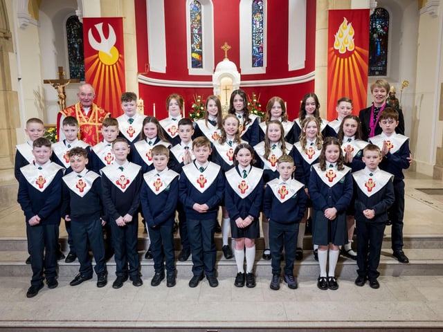 Pupils from Mrs McConnell's Class, St Patrick's Primary School, pictured at their confirmation at St Patrick's Chapel, Pennyburn. Included, is Fr Noel McDermott. (Stephen Latimer)