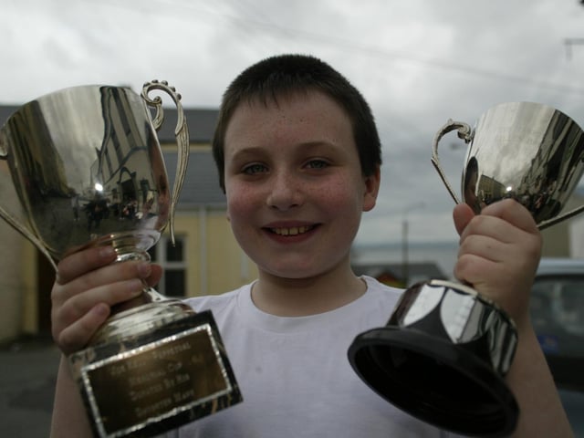 Aaron Deery, winner of the Sacrad solo (10 - 16yrs) and winner of the Boys song (10 - 12yrs) at Moville Feis. (0405JB66):Winners at the Moville Feis in 2004.:Moville Feis 2004
