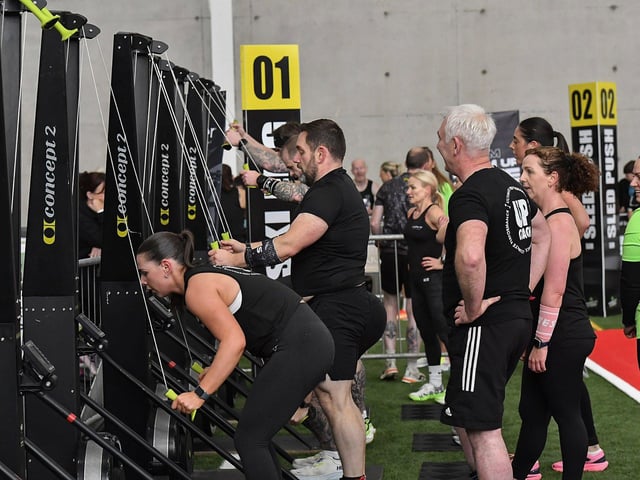 Competitors during the first of the functional stations, the Ski erg during the Maiden City Hyrox V Fitness Challenge held at Sean Dolans GAC on Saturday. Photograph: George Sweeney