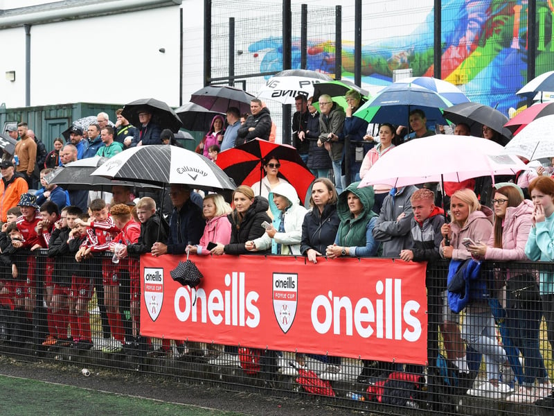 A section of the large crowd which braved the elements to enjoy the O'Neills Foyle Cup Under-11's final between Shankill Juniors and Glenavon at the Bishop's Field.