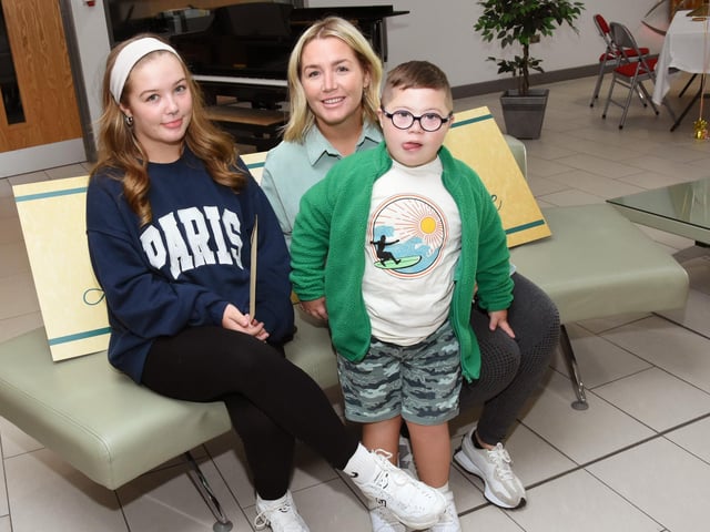 St Cecilia's College student, Abigail Loughrey, pictured with her mum Lisa and little brother Ollie collecting her GCSE results.