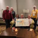 The Waterside Royal British Legion have raised £3,830 for Marie Curie by organising a dance in memory of Lorraine Campbell and Ian Donnell. Organisers Catherine and Wesley Gamble, Janice McCready, Janette Simpson, Billy and Donna Moore presented the cheque to Joan Doherty, Marie Curie.