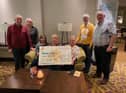 The Waterside Royal British Legion have raised £3,830 for Marie Curie by organising a dance in memory of Lorraine Campbell and Ian Donnell. Organisers Catherine and Wesley Gamble, Janice McCready, Janette Simpson, Billy and Donna Moore presented the cheque to Joan Doherty, Marie Curie.