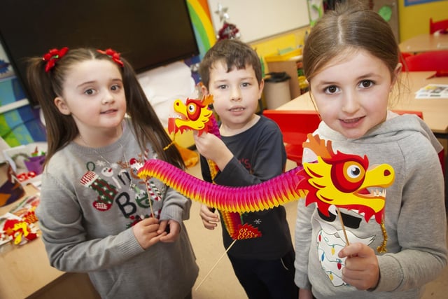 Jade, Jaydn and Beth showing off some of their artwork during last week’s visit by the Chinese Confucius Group to Steelstown PS.