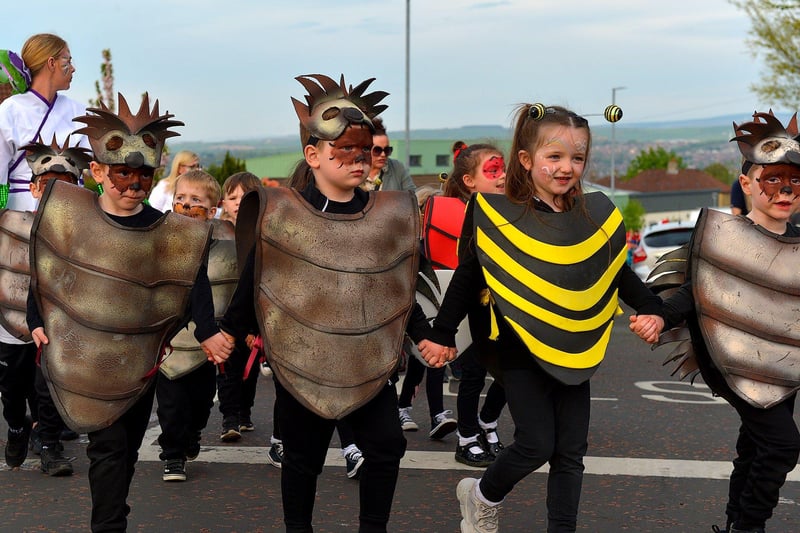 Colourful costumes on show at the Bealtaine Parade in Creggan on Wednesday evening. Photo: George Sweeney. DER2318GS – 57