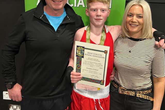 Joshua pictured with his proud parents Darrell and Andrina Cairns.