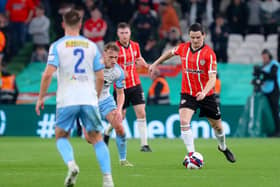 Derry City's Ciaran Coll calmly brings the ball out from the back against Shelbourne, in the Extra.ie FAI Cup Final.